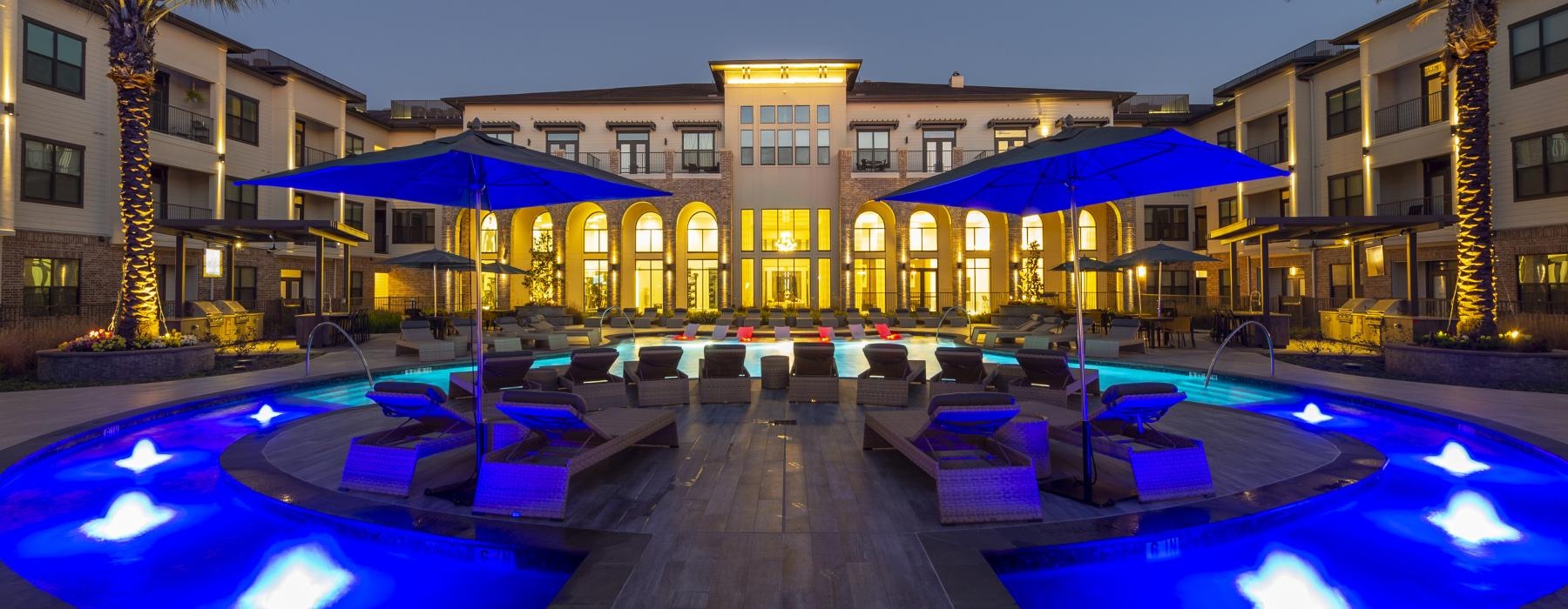 a pool in front of a building